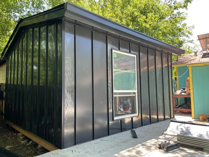 Black standing seam metal wall panels for Roof Inspection in Speedway