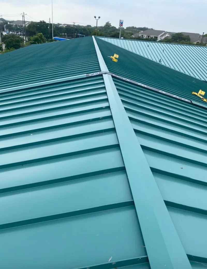 Green commercial metal roof ridge and valley for Metal Roof Repair in Speedway